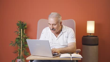 Old-man-chatting-on-laptop.